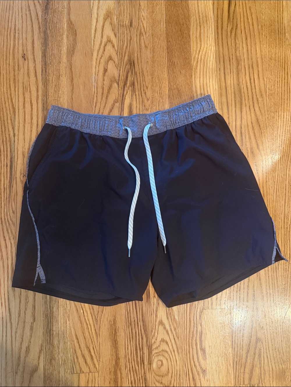 Vuori Black Athletic Shorts with Gray Waistband and White Drawcord